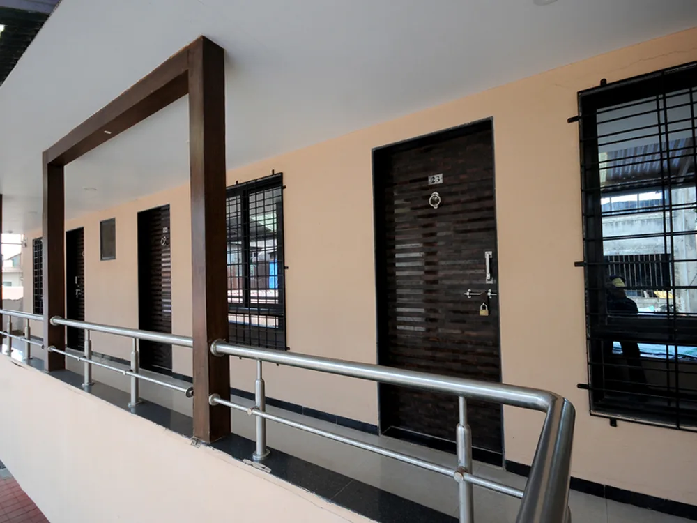 Open-air corridor and common walkway at Hotel Vyankatesh